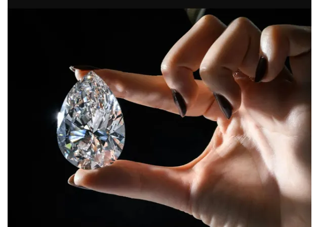 https://comparethediamond.com/image/cache/catalog/blog-images/Large%20Sparkling%20Pear%20Cut%20Diamond-630x450.webp