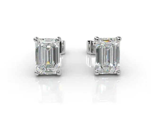 4-Claw Earrings<br />Certified Emerald-Cut Diamonds<br />100% Recycled, Hallmarked 18ct. White Gold 4-Claw Earrings<br />Certified Emerald-Cut Diamonds<br />100% Recycled, Hallmarked 18ct. White Gold