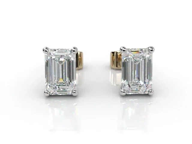 4-Claw Earrings<br />Certified Emerald-Cut Diamonds<br />100% Recycled, Hallmarked 18ct. Yellow and White Gold 4-Claw Earrings<br />Certified Emerald-Cut Diamonds<br />100% Recycled, Hallmarked 18ct. Yellow and White Gold