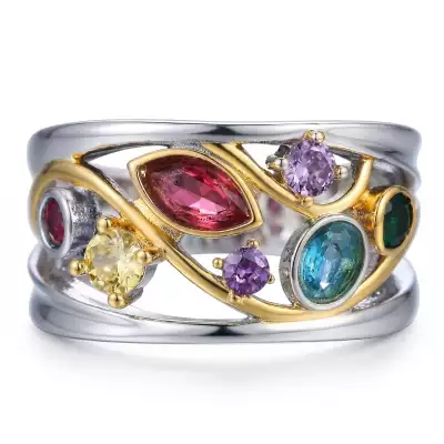 Openwork heirloom crossover ring – recommissioned jewellery design featuring reused gemstones and precious metal